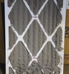 Very dirty air filter that caused an AC unit to freeze up with ice