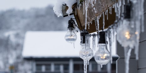 missouri home in winter with icicles