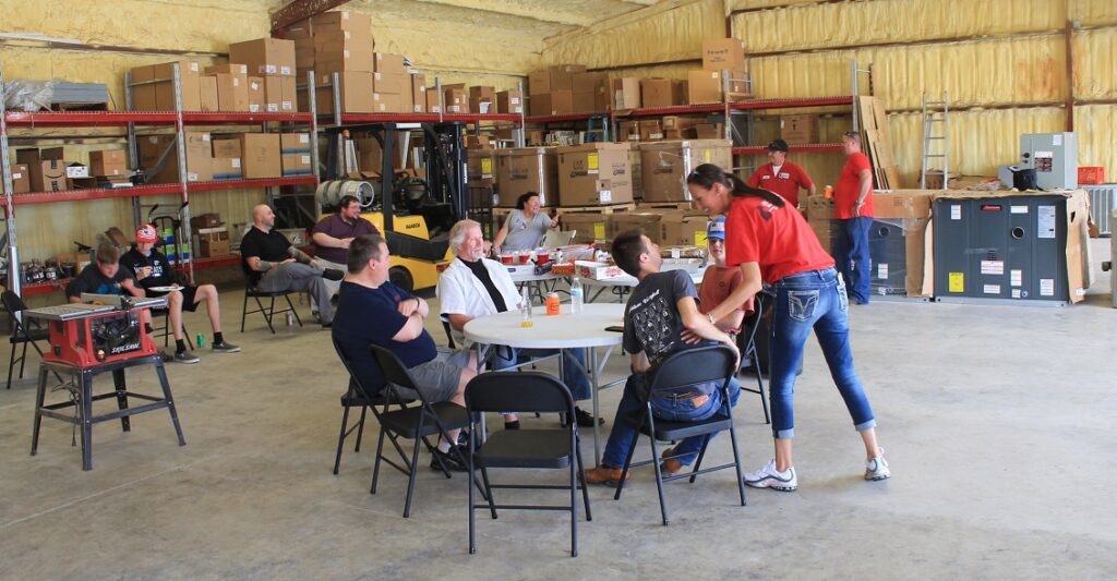 Team of HVAC staff celebrating fish fry over Memorial Day weekend in Mt Vernon