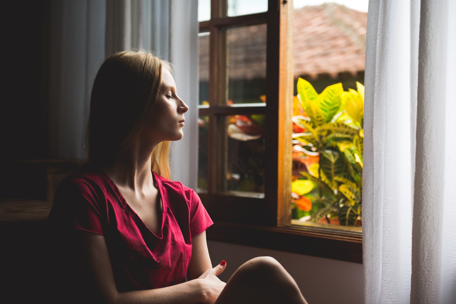 3 Tips on How to Improve Indoor Air Quality Lady looking out window, 3 Tips on How to Improve Indoor Air Quality